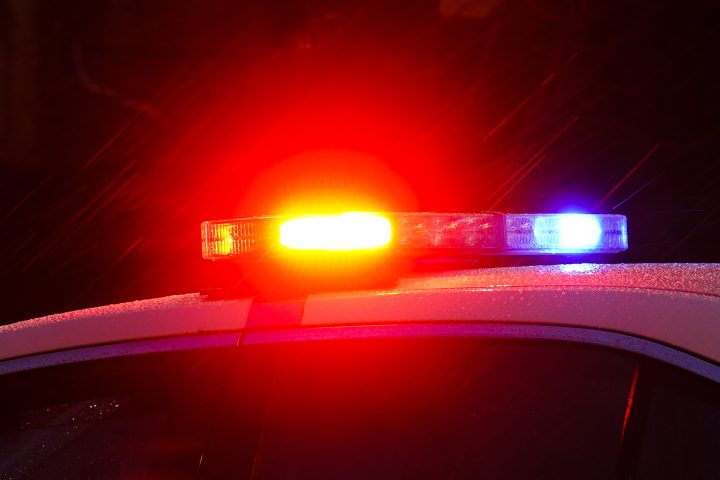 A police car with flashing lights is shown in this file image.