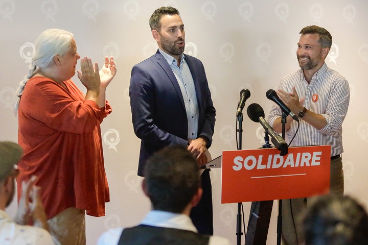 Olivier Bolduc is applauded by Québec solidaire co-leaders Manon Massé and Gabriel Nadeau-Dubois after he wins the party's nomination the next byelection in the riding of Jean-Talon at the Université Laval in Quebec City August 6, 2023. 