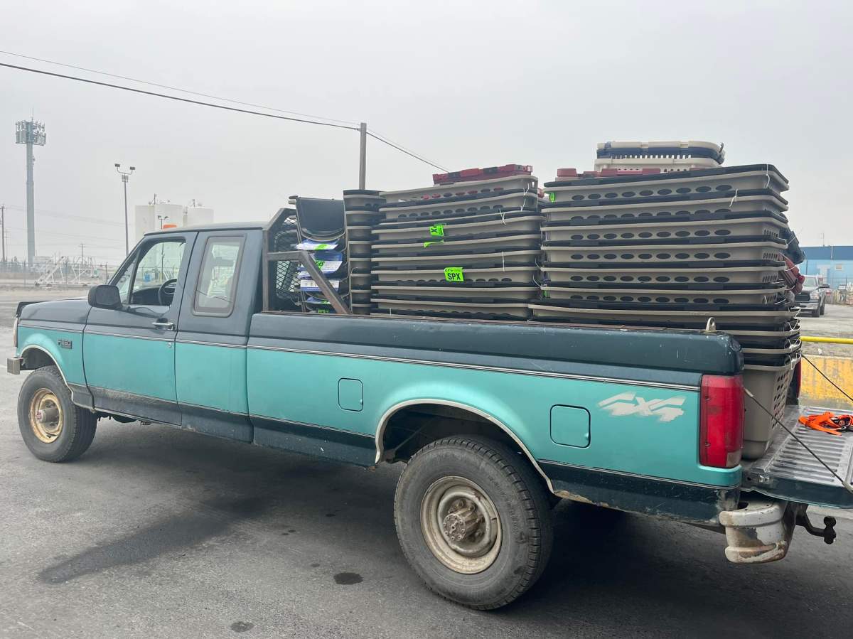 Veterinarians Without Borders sent crates from across Canada to Yellowknife to help people take their pets on evacuation flights as a fire approached the Northwest Territories capital city. A pickup truck carrying pet crates is seen in Yellowknife in an undated handout photo.