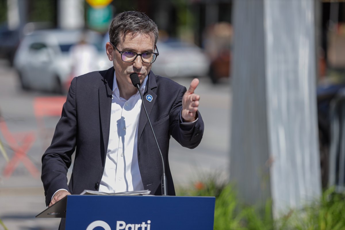 Parti Québécois candidate Pascal Paradis speaks during a news conference on Thursday, Aug. 24, 2023, in Quebec City.