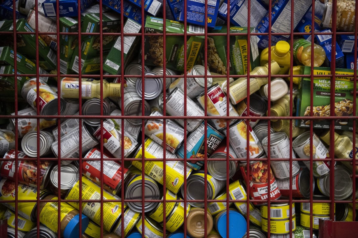 Nonperishable food items are seen in a container at an Ontario food bank. Hamilton's council finalized an emergency grant of $625,000 to provide immediate support to local food banks. THE CANADIAN PRESS/Justin Tang.