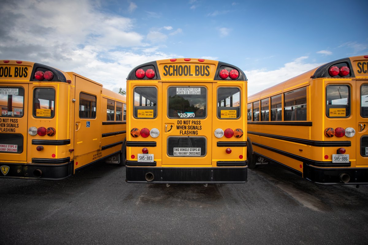 School buses pictured in Kingston, Ont., on Tuesday, Aug 11, 2020.