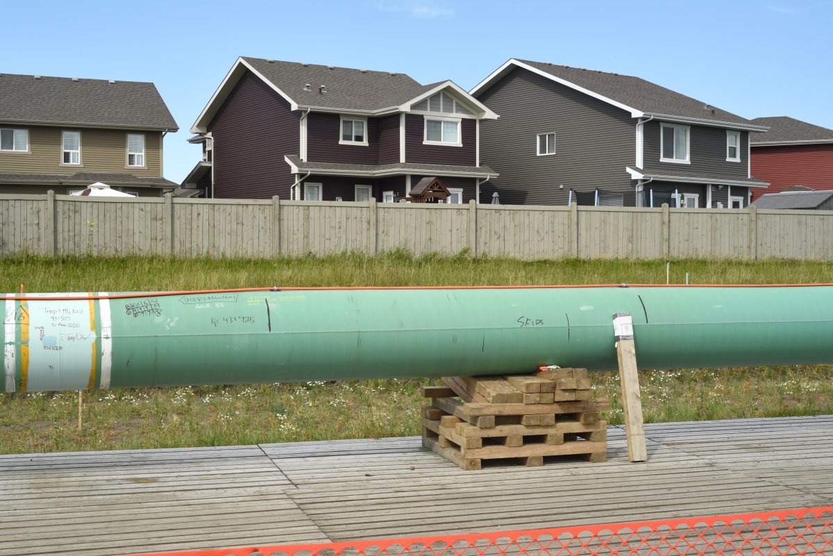 Construction work continues on the Trans Mountain pipeline expansion project among homes in the Rosenthal neighbourhood in Edmonton, Alberta on August 17, 2020. The expansion pipeline will run from Strathcona County near Edmonton to Burnaby, British Columbia.