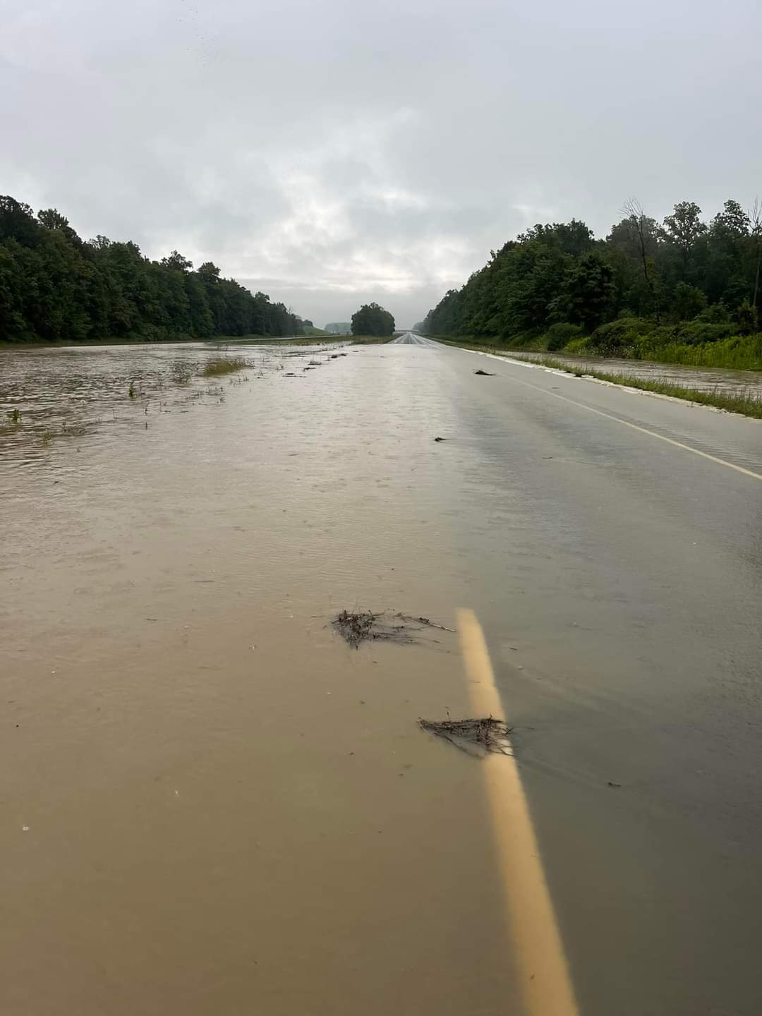 A photo taken by Warwick Fire and Rescue shows the road flooding caused by heavy rain Wednesday.