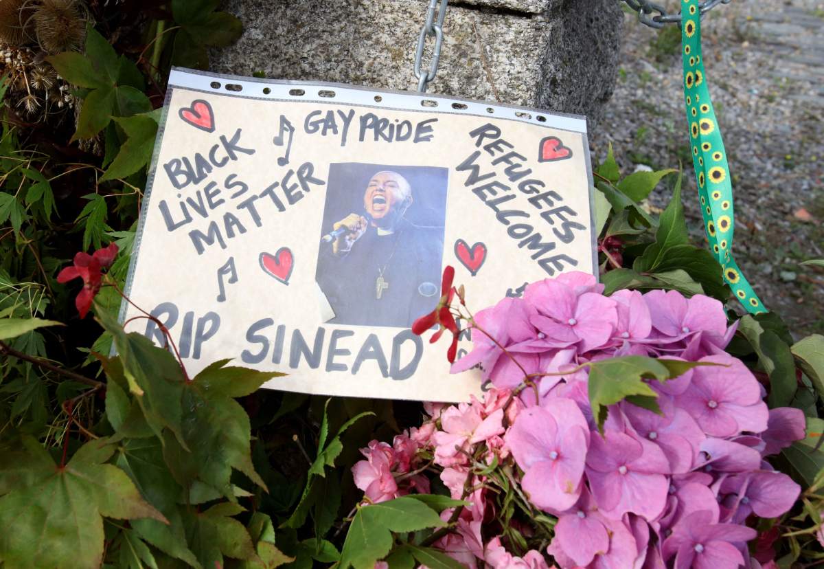 A poster dedicated to Sinéad O'Connor. It reads "Black Lives Matter," "Gay Pride" and "Refugees Welcome."
