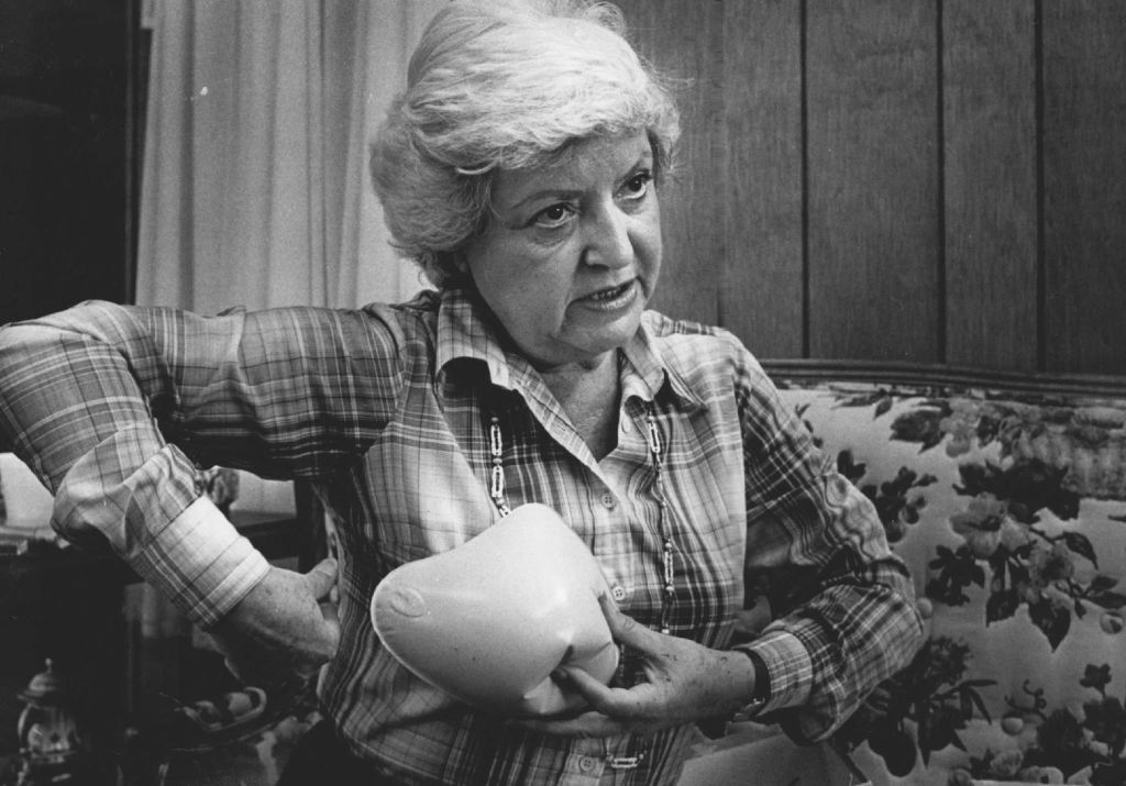 Ruth Handler demonstrates how her "Nearly Me" prosthesis "fills in the cavities" left over after a mastectomy surgery.