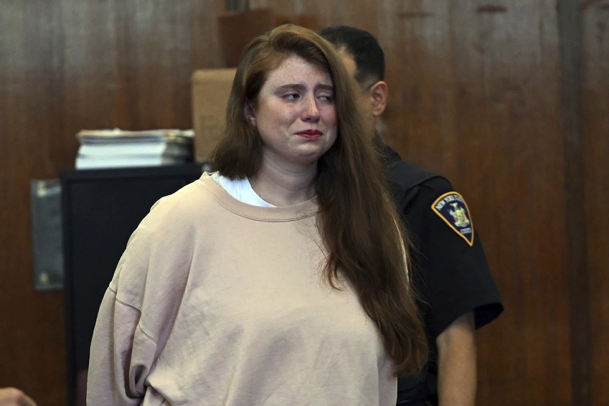 Lauren Pazienza in court. She is wearing prison beige.