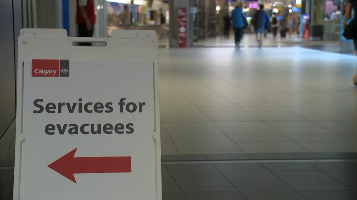Photo of the evacuation centre sign at the Calgary International Airport.