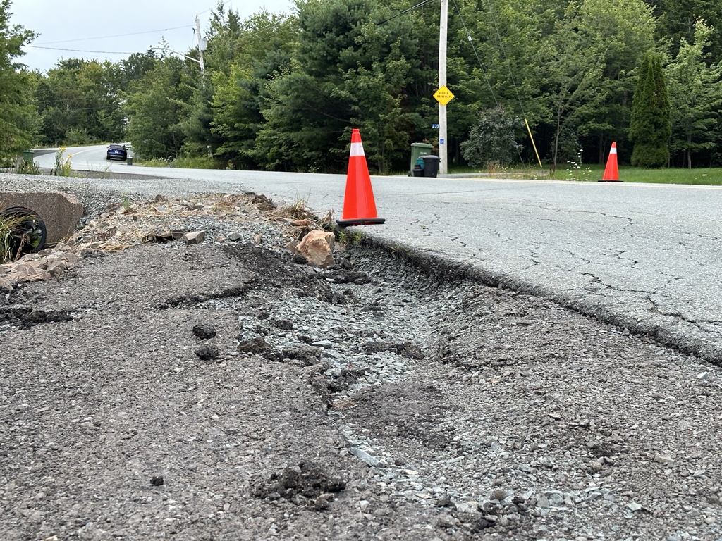 Many road shoulders have yet to be repaired weeks after the devastating Nova Scotia flash floods.