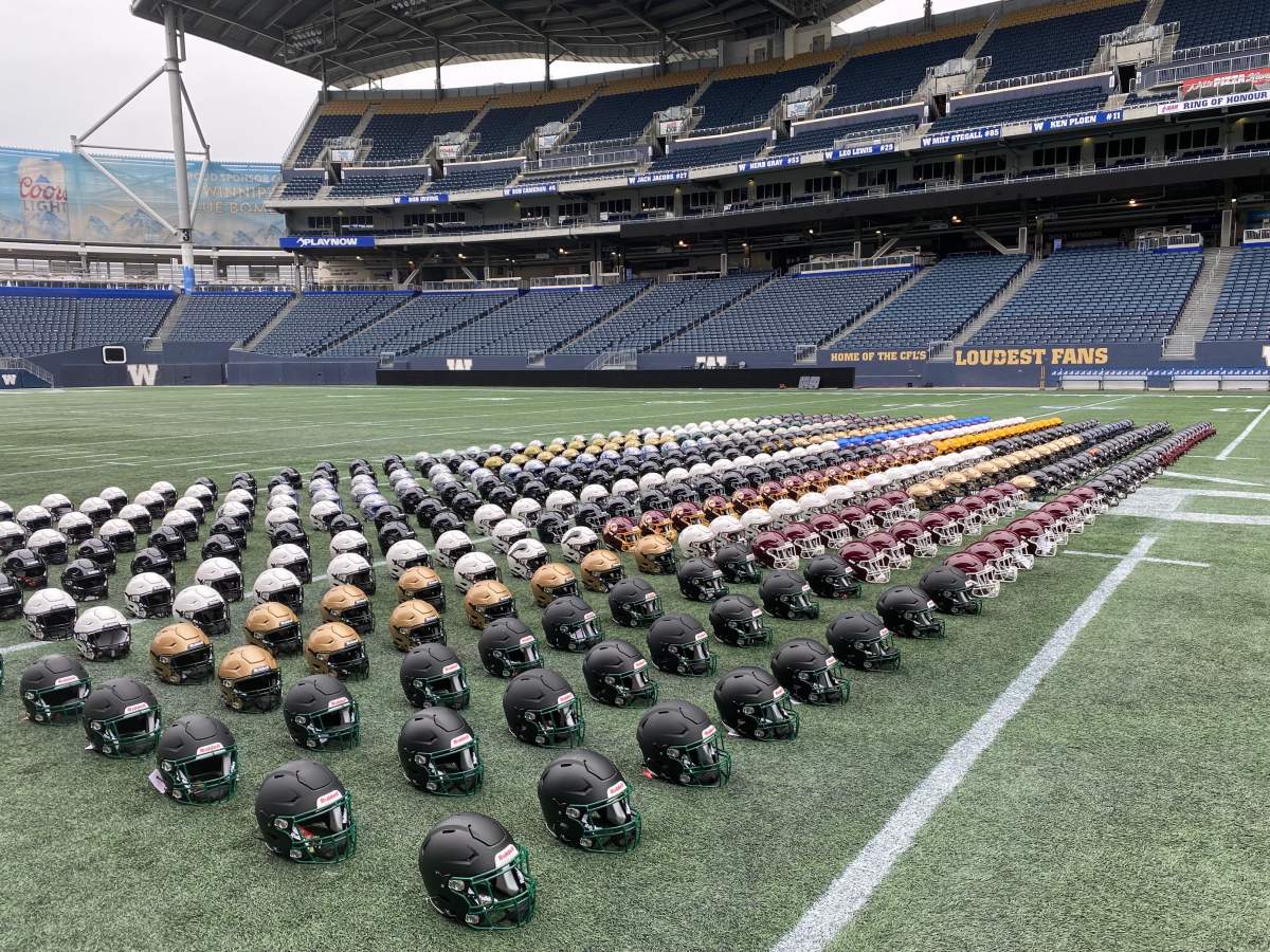 Helmets on display Tuesday at IG Field.