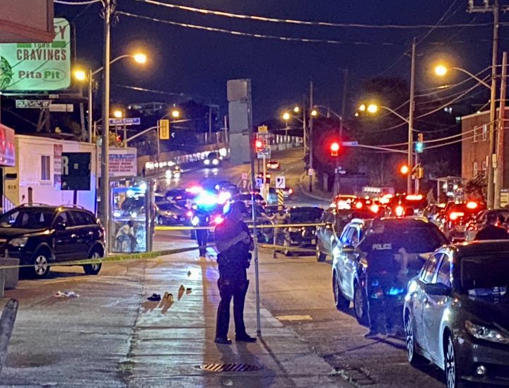 Police on the scene of a shooting in Toronto on Aug. 11, 2023.