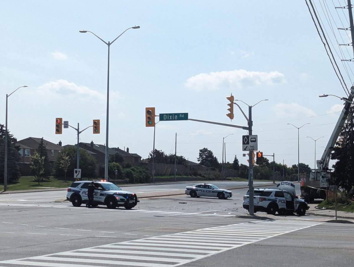 The scene following a collision between a civilian vehicle and a Peel Regional Police cruiser in Brampton.