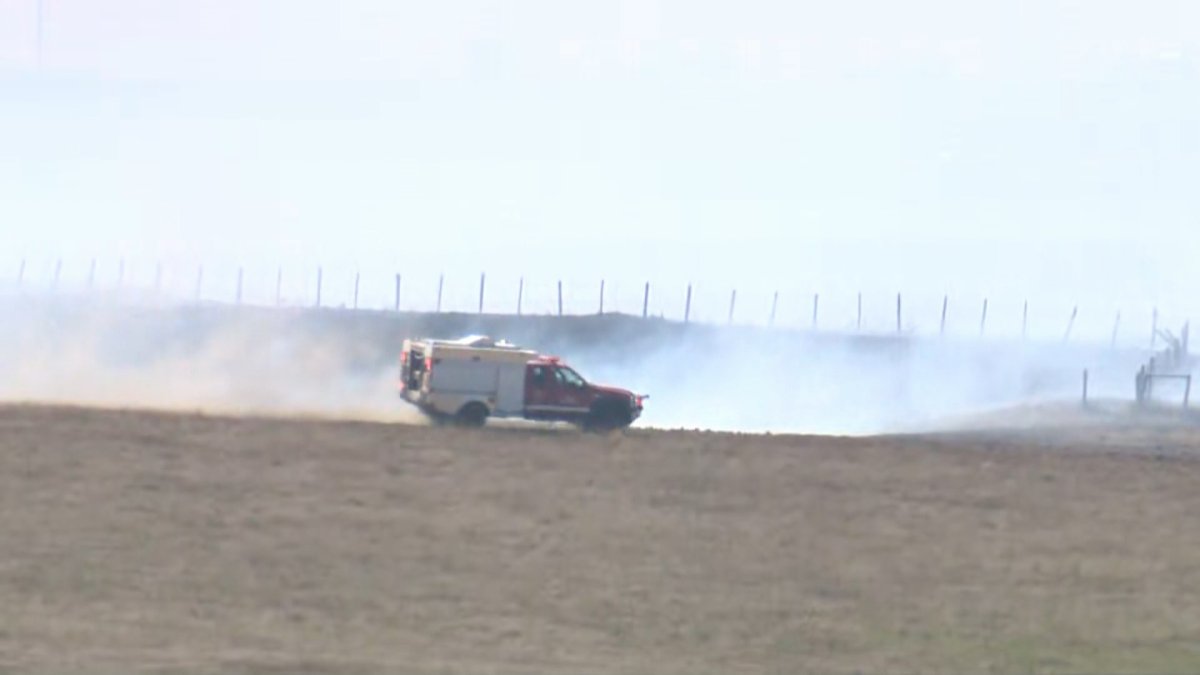 A large grass fire was spotted in the area of 48 Street and 418 Avenue East just outside of Okotoks