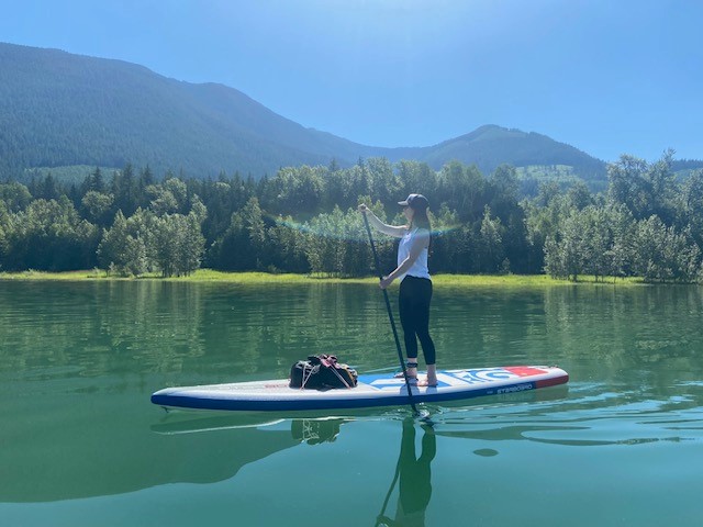 Michelle Schiewe, seen here in the wilderness near Revelstoke, B.C., says she’s being forced to leave the small resort city for Saskatchewan due to the rising cost of living.