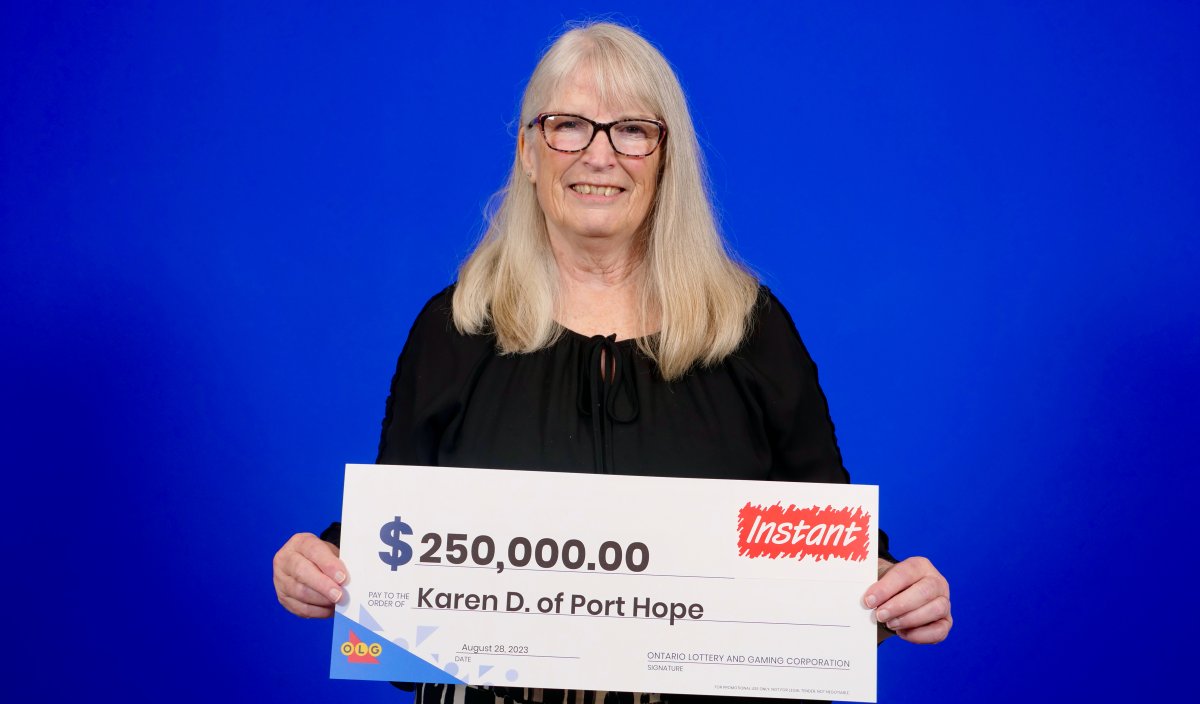  Karen Dobrini of Port Hope, Ont., is $250,000 richer after winning with the OLG's Instant Scrabble game.