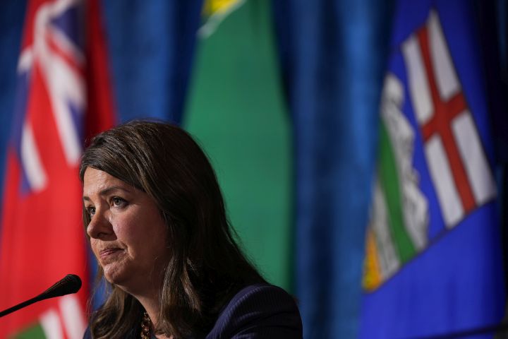 Alberta Premier Danielle Smith pauses after responding to a question during a news conference after a meeting of western premiers, in Whistler, B.C., on Tuesday, June 27, 2023.