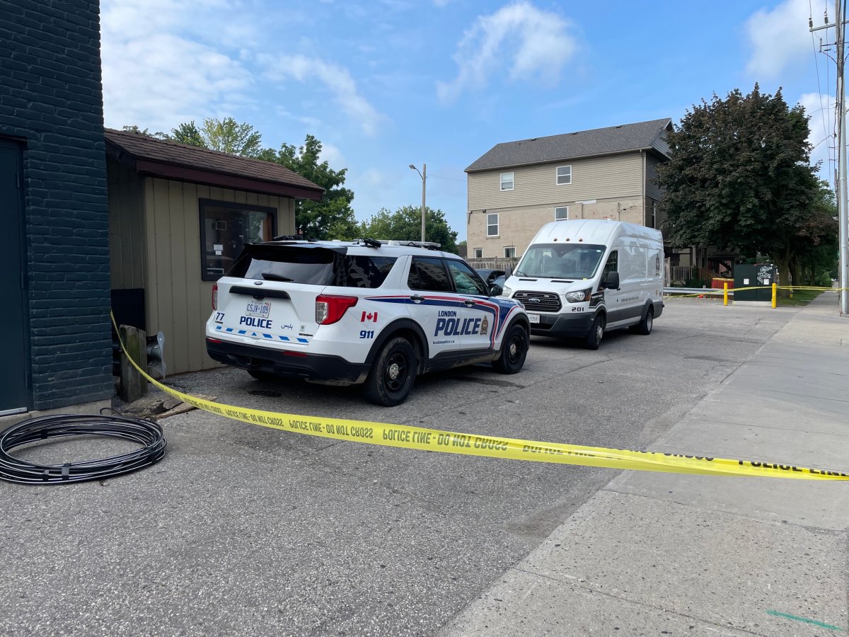 London, Ont., police cruisers seen behind The CEEPS bar at 671 Richmond St. following a shooting in the area early Thursday morning on Aug. 17, 2023.