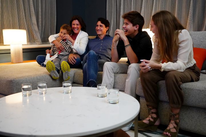 The Trudeau family sits together on a couch