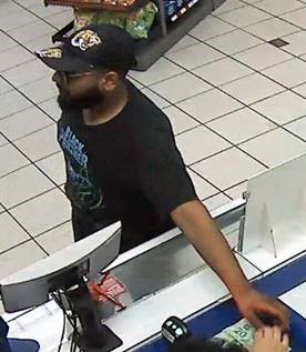 Police are seeking to identify a suspect wanted in connection with an investigation into vehicle thefts.