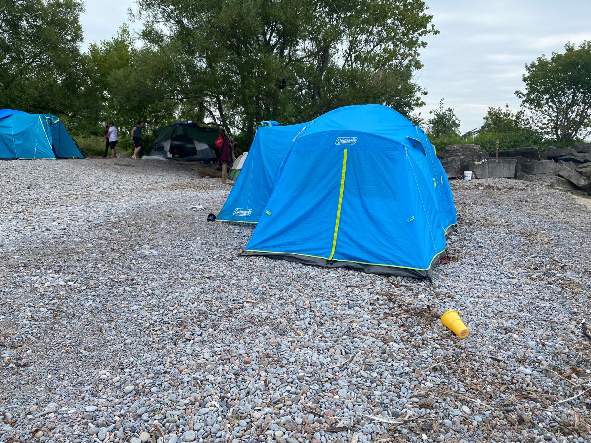 Police in Cobourg, Ont., investigated reports of gunshots near a tent encampment on Aug. 16, 2023. 