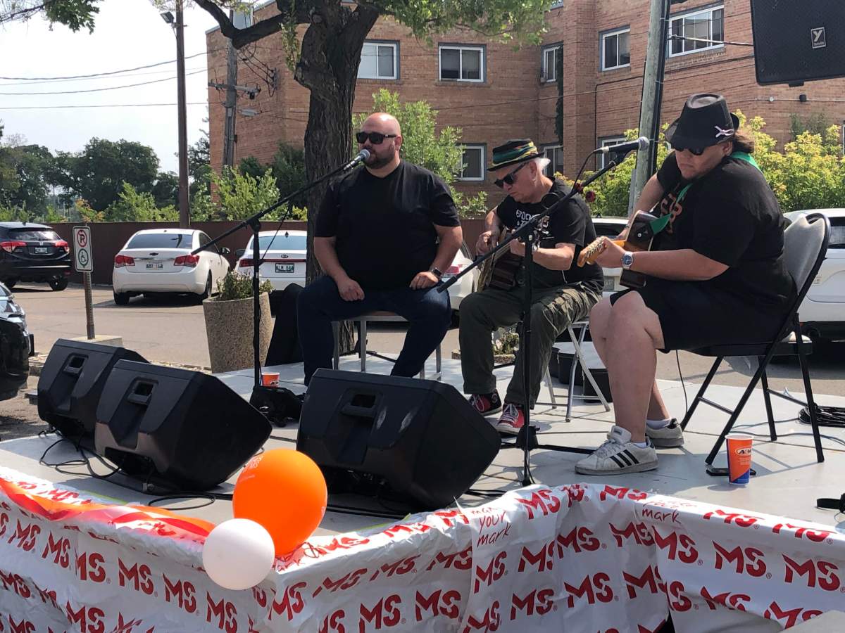 Winnipeg blues band D.B. and the Deadbeats performs Thursday afternoon in the parking lot of the A&W restaurant at 1520 Portage Ave.