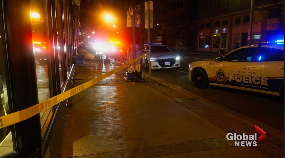 Police closed off a section of sidewalk following a reported stabbing on George Street in downtown Peterborough on Aug. 8, 2023.