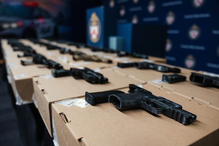 Twenty-eight guns were seized from a Toronto hotel room on Aug. 21, police say.