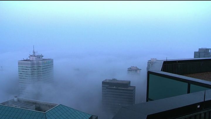 Fog is seen in downtown Edmonton on Aug. 25, 2023.