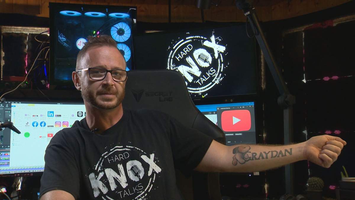 Daniel Hearn showing of the tattoo he has, reminding him when his son was taken away due to his excessive drug use. Vowing to never letting it happen again.