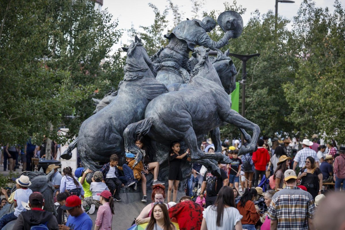 One of the three dozen men behind a sexual abuse lawsuit filed against the Calgary Stampede says its apology after a partial court settlement last week falls short. Visitors take in the midway at the Calgary Stampede on July 10, 2022. 