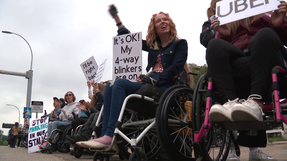 The Wheelie Peeps, disability advocates who were featured in the docuseries PUSH, hosted a peaceful protest in Edmonton on Tuesday, Aug. 22, 2023 to bring awareness and call for municipal authorities to do more when it comes to enforcing who is allowed to park in accessible parking spots.