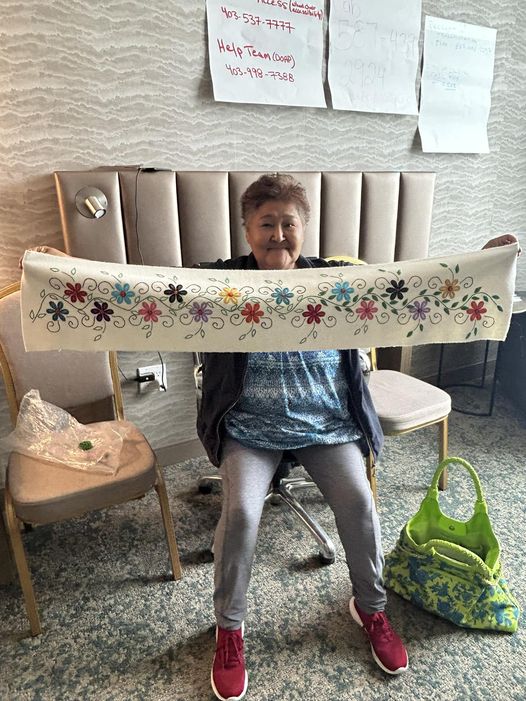 Winnie Hatkaittuq spends her days as a wildfire evacuee in Calgary doing the Inuit-style embroidery she learned from her aunt in Gjoa Haven, Nunavut.