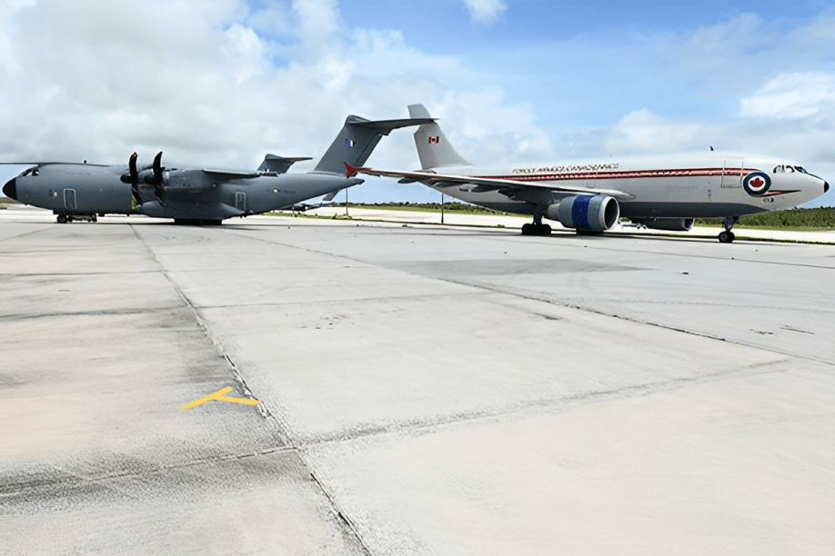 This image provided by the Department of National Defence shows the aftermath of a collision between a Royal Canadian Air Force CC150 Polaris aircraft and a French Air Force A400M plane on the tarmac of a U.S. Air Force base in Guam on July 21, 2023.