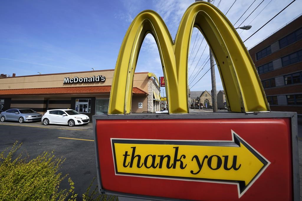 FILE - An exit sign is shown at a McDonald's restaurant in Pittsburgh, April 23, 2022. Food ads have long made their subjects look bigger, juicier and crispier than they are in person. But some consumers say those mouthwatering ads can cross the line into deception, and that’s leading to a growing number of lawsuits. Burger King is the latest company in the crosshairs. While the case against Burger King was filed in Miami, one of the attorneys who filed it has similar cases pending in New York against Wendy’s, McDonald’s and Taco Bell. (AP Photo/Gene J. Puskar, File).