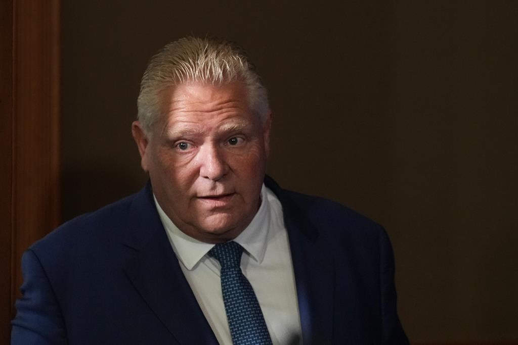Ontario Premier Doug Ford enters a room to speak to journalists at the Queens Park Legislature in Toronto on Tuesday, Sept. 5, 2023. 