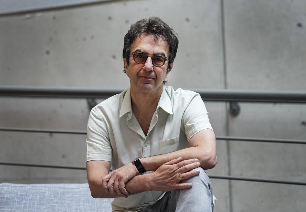 Director Atom Egoyan poses for a photograph in Toronto, Friday, Aug. 18, 2023. The Canadian Opera Company will partner with director Atom Egoyan for the Toronto International Film Festival premiere of "Seven Veils," at the Four Seasons Centre for the Performing Arts tonight.THE CANADIAN PRESS/Nathan Denette.
