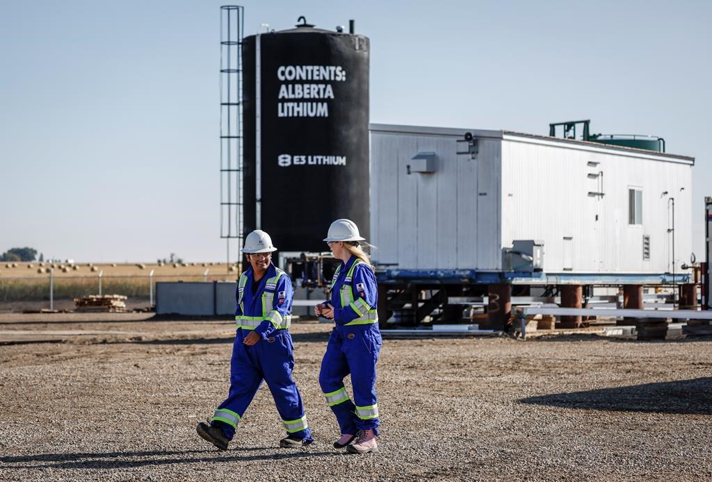 E3 Lithium employees walk through the company's lithium pilot plant near Olds, Alta., Thursday, Sept. 7, 2023. THE CANADIAN PRESS/Jeff McIntosh