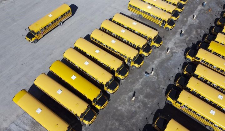 As the new school year starts up in Ottawa, thousands of parents and students have been scrambling to find rides with hundreds of school bus runs cancelled due to a driver shortage. In this photo taken using a drone, school buses are seen in a lot in Ottawa on Monday, April 18, 2022. 