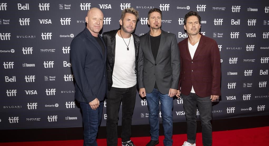 Nickelback band members, left to right, Michael Kroeger, Chad Kroeger, Daniel Adair and Ryan Peake pose for a photograph on the red carpet for the movie "Hate to Love: Nickelback” at the Toronto International Film Festival in Toronto, Friday, Sept. 8, 2023.