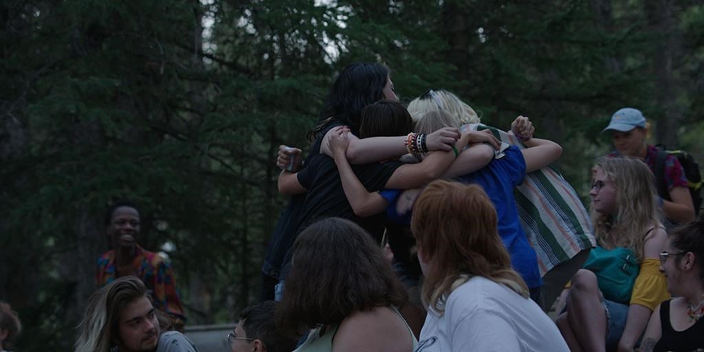 Campers embrace in an undated still image handout from the documentary "Summer Qamp". The documentary, which premieres Saturday at the Toronto International Film Festival, is a lovingly rendered portrait of chaotic queer joy and gender euphoria, made possible because of the relationship Markowitz built with their subjects. THE CANADIAN PRESS/HO-TIFF, *MANDATORY CREDIT*.