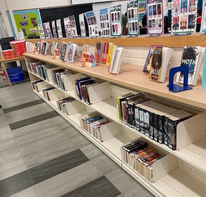 Empty shelves at the library at Erindale Secondary School in Mississauga, Ont. are shown in a handout photo. Ontario's minister of education says he has asked an Ontario public school board to immediately stop its new, and seemingly arbitrary practise of removing books that were published before 2008 from school libraries. 
 
