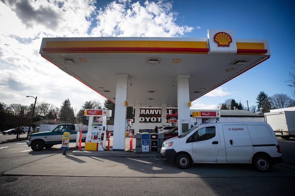 FILE: Motorists fuel up vehicles at a Shell gas station in Vancouver, B.C., March 8, 2022. A recent Research Co. poll asked British Columbians their thoughts on the future of the provincial carbon tax.