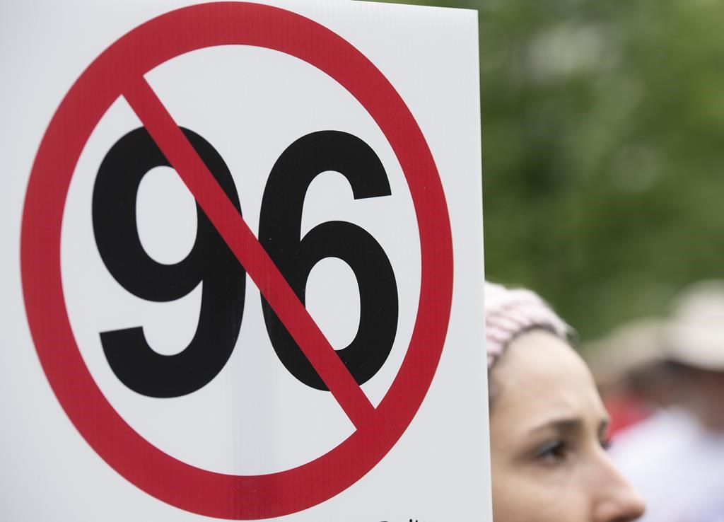 Two Montreal-Island towns have filed a court challenge today to Quebec's 2022 language law reform, seeking to have several articles of the law commonly known as Bill 96 declared inapplicable to them. People take part in a protest against the bill in Montreal, Thursday, May 26, 2022.