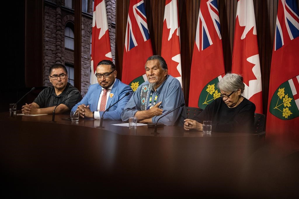 Members of the Land Defence Alliance, left to right, Chief Rudy Turtle of Grassy Narrows First Nation, Sol Mamakwa MPP, Elder Alex Moonias from Neskantaga First Nation and Cecilia Begg from Kitchenuhmaykoosib Inninuwug First Nation hold a press conference at Queen's Park in Toronto on Tuesday, September 26, 2023. THE CANADIAN PRESS/Carlos Osorio.