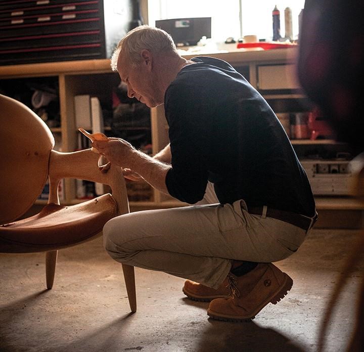 Furniture maker Jonathan Otter works on a chair in a handout photo. The work, titled "solace", is being sold as part of a fundraiser for Atlantic Canadians harmed by post-tropical storm Fiona on Sept. 24, 2022. THE CANADIAN PRESS/HO-Max Mezo.