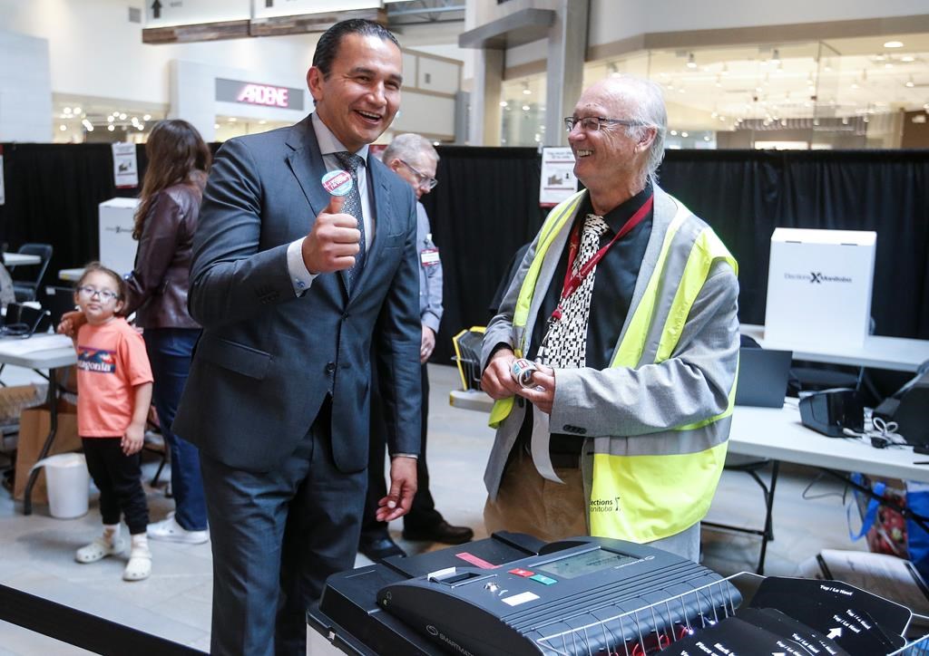 Manitoba New Democrat leaer Wab Kinew votes in an early poll in Winnipeg on Sept. 23, 2023. Manitobans go to the polls October 3. THE CANADIAN PRESS/John Woods.