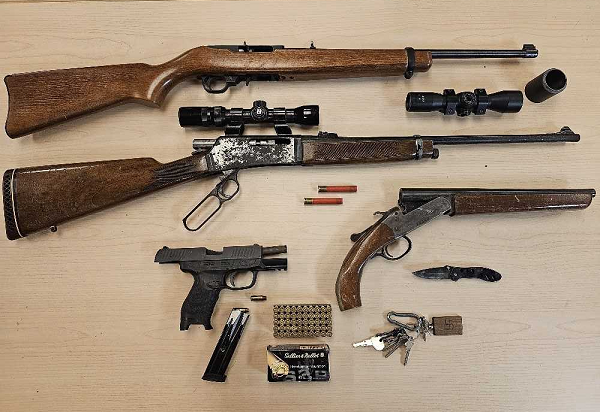 Firearms Kingston police seized from a 26 year old local.