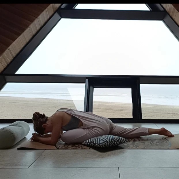 Millie Laws practicing yoga at the North Sea Observatory.