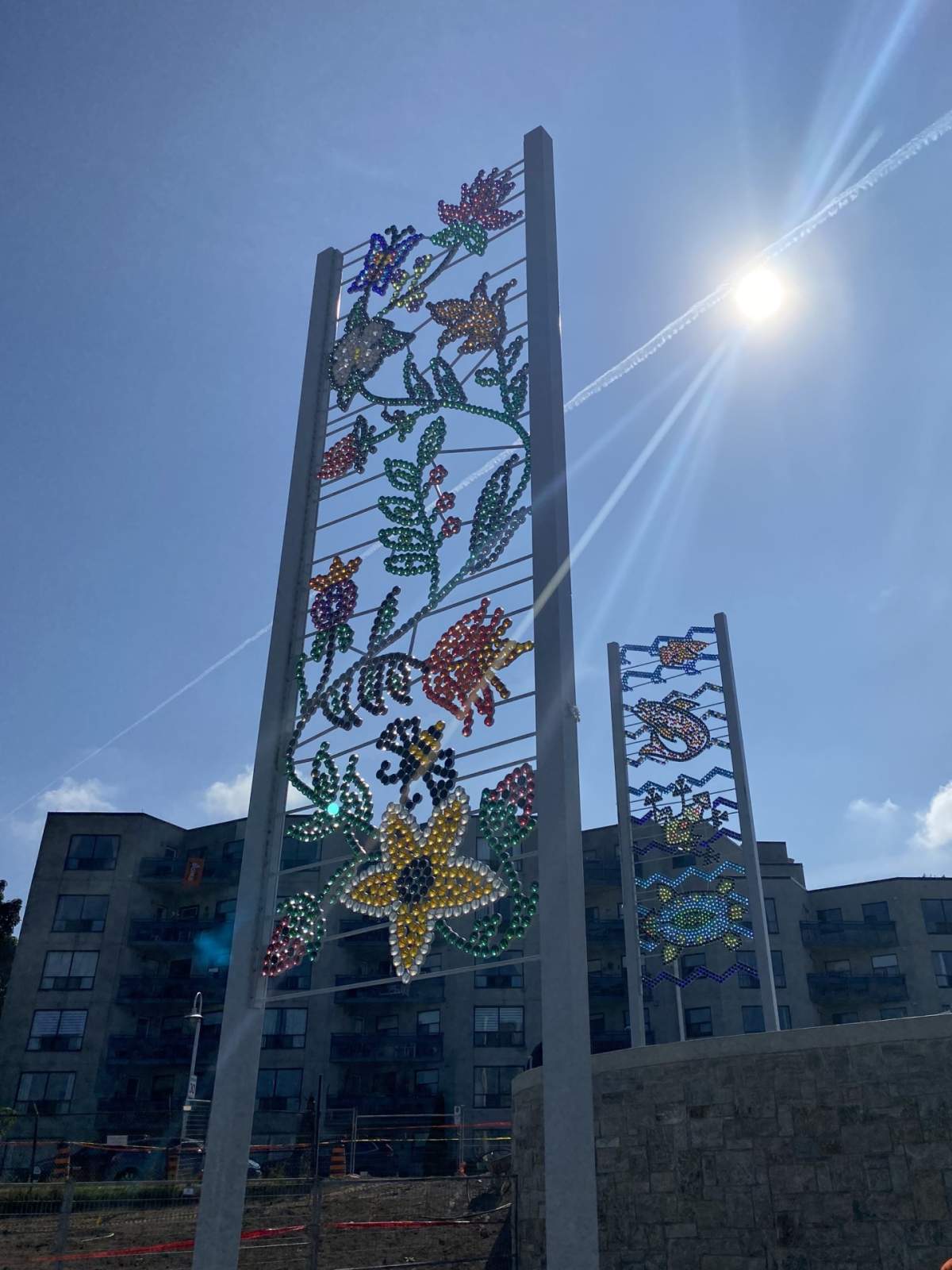Two 40-foot tall panels with glass beads as part of an art installation on Hamilton's waterfront that has been designed by a local Indigenous artist.