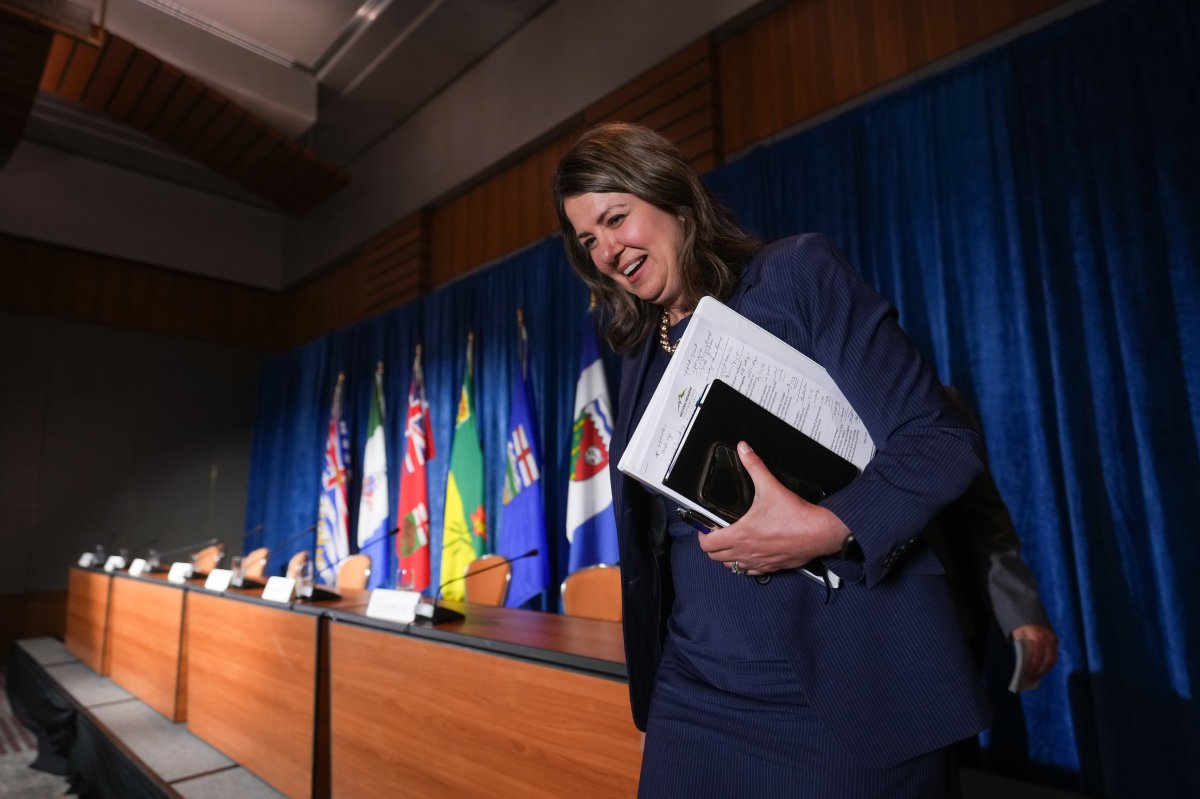 Alberta Premier Danielle Smith leaves after a news conference following a meeting of western premiers, in Whistler, B.C., on Tuesday, June 27, 2023.